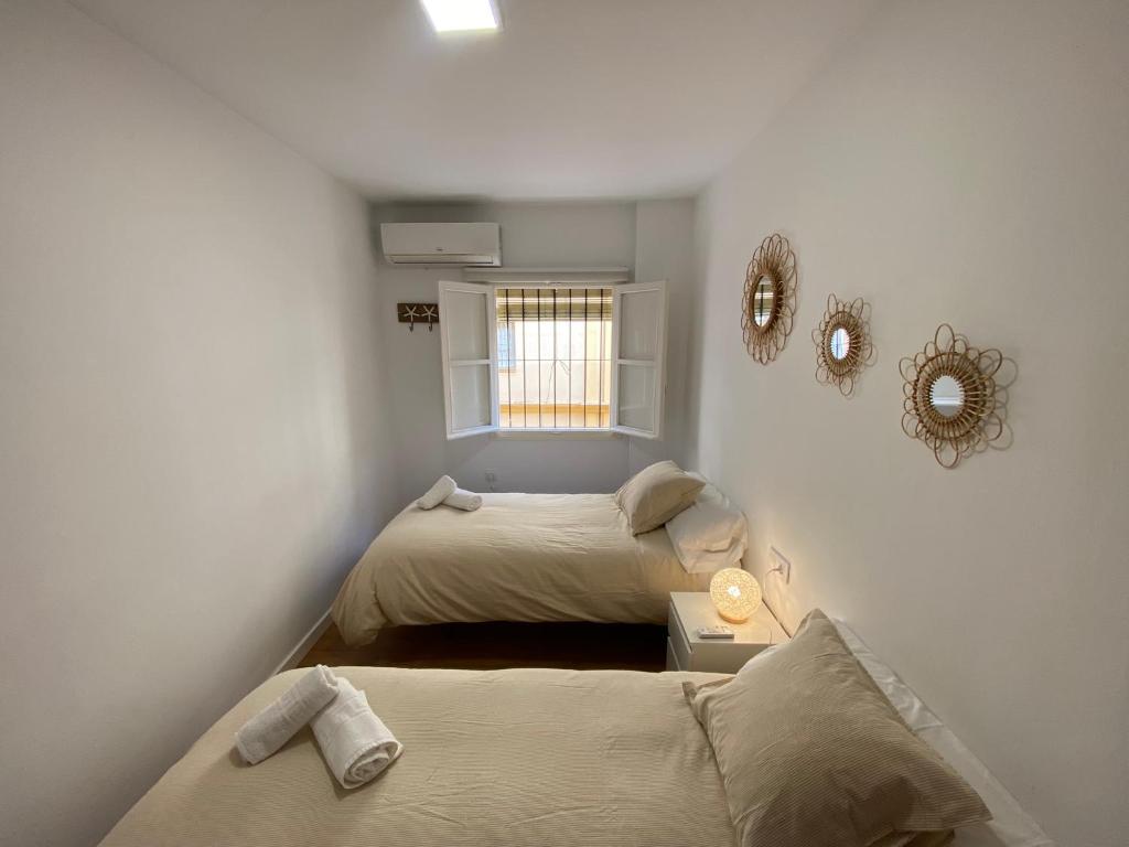 Postel nebo postele na pokoji v ubytování Sánchez Home, Pleno Centro