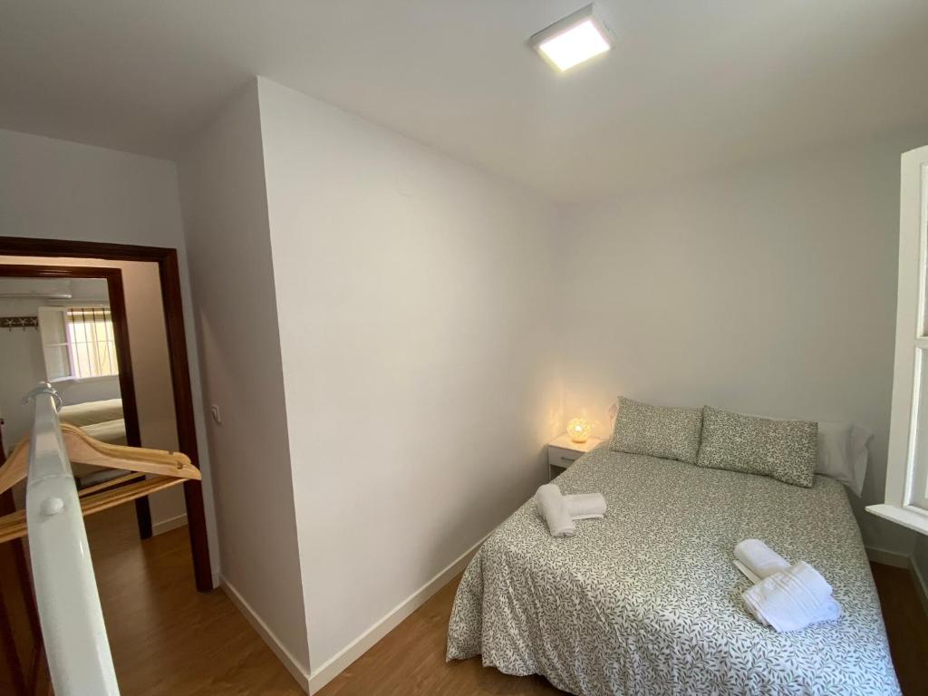 Postel nebo postele na pokoji v ubytování Sánchez Home, Pleno Centro