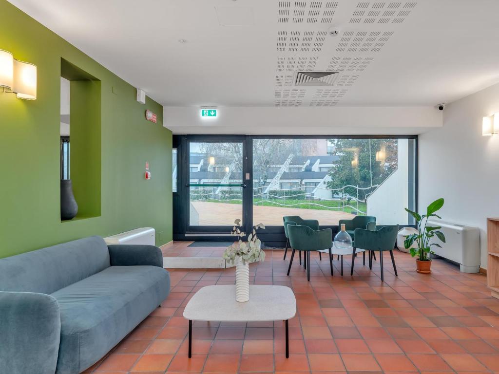 Posezení v ubytování B&B HOTEL Alba