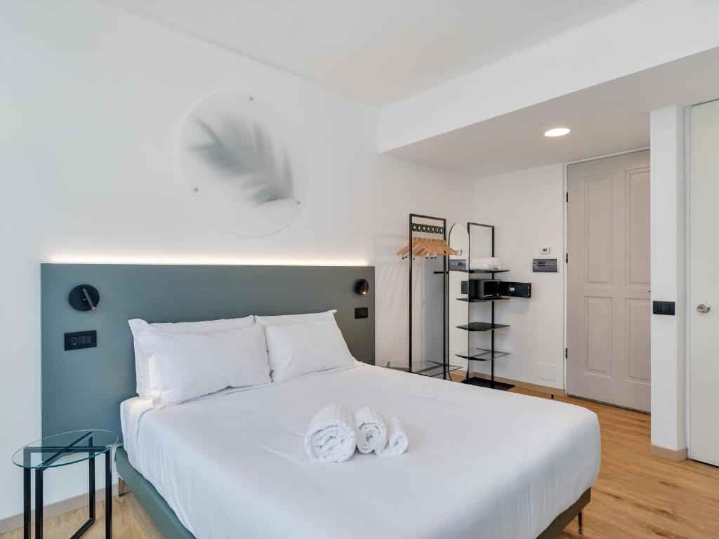 Postel nebo postele na pokoji v ubytování B&B HOTEL Alba