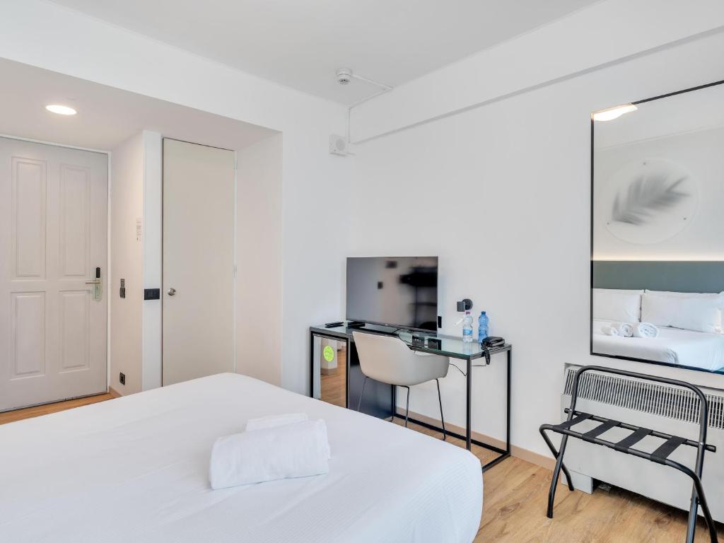Postel nebo postele na pokoji v ubytování B&B HOTEL Alba