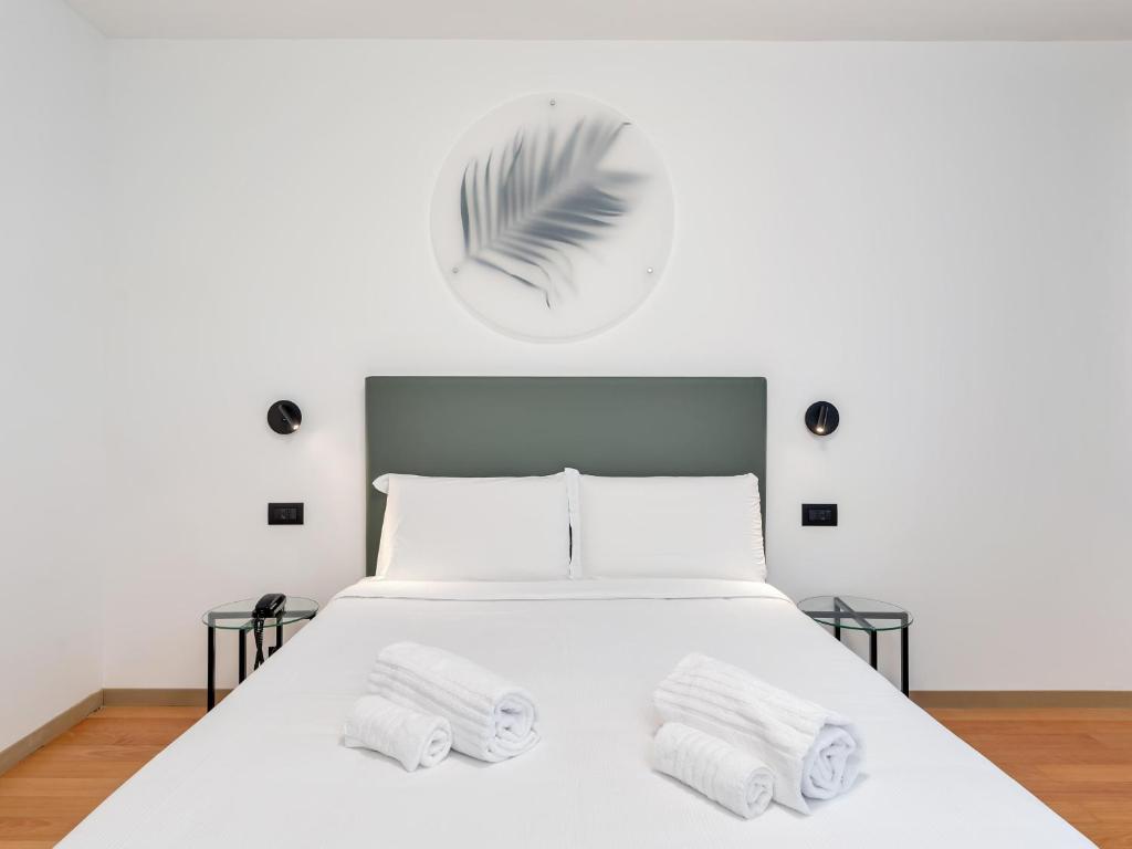 Postel nebo postele na pokoji v ubytování B&B HOTEL Alba