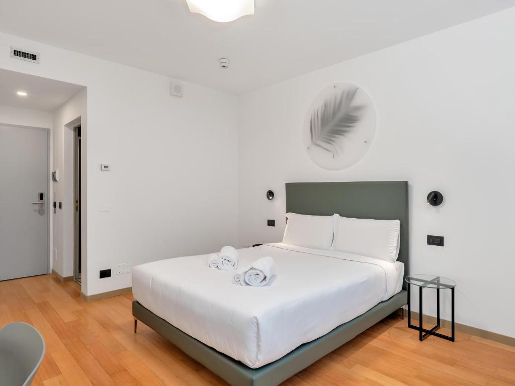 Postel nebo postele na pokoji v ubytování B&B HOTEL Alba