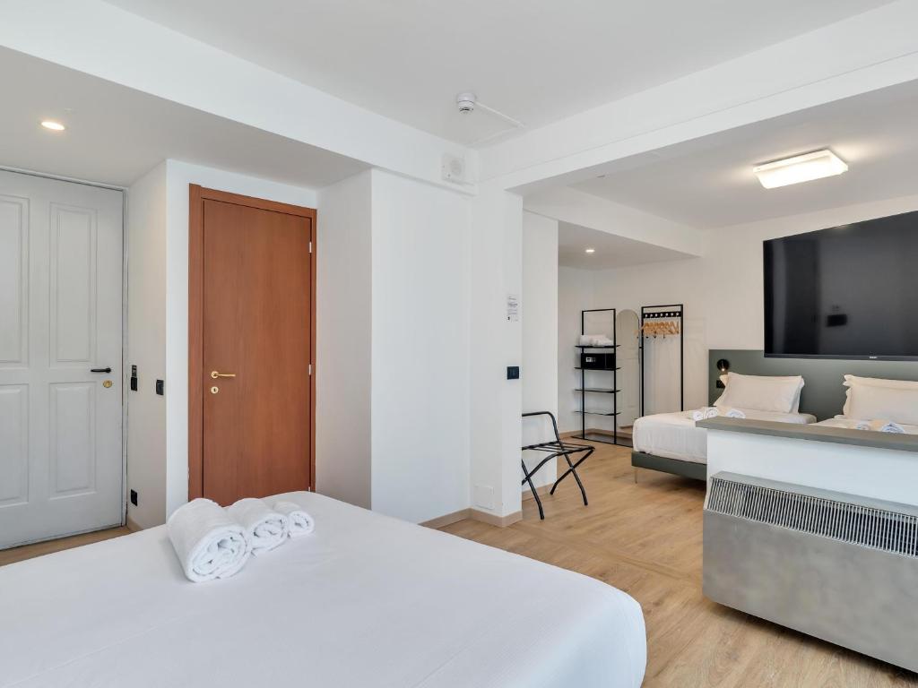 Postel nebo postele na pokoji v ubytování B&B HOTEL Alba