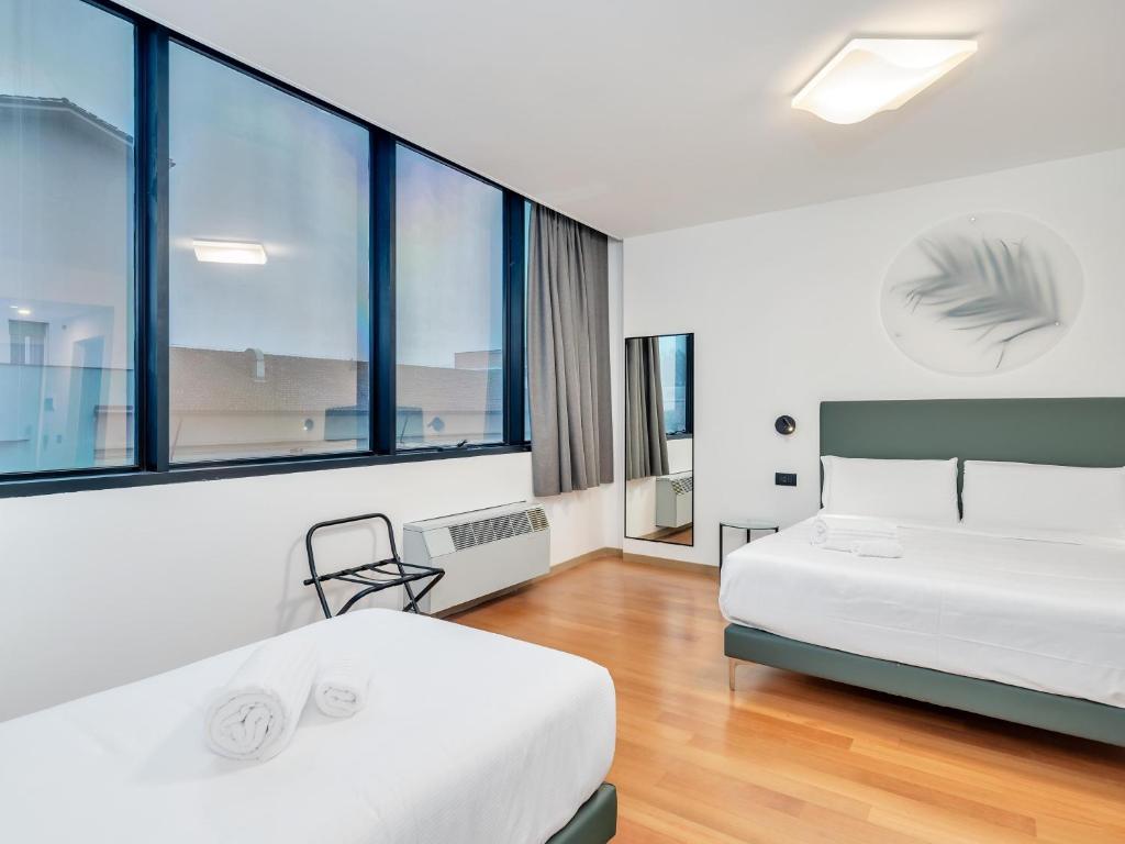 Postel nebo postele na pokoji v ubytování B&B HOTEL Alba