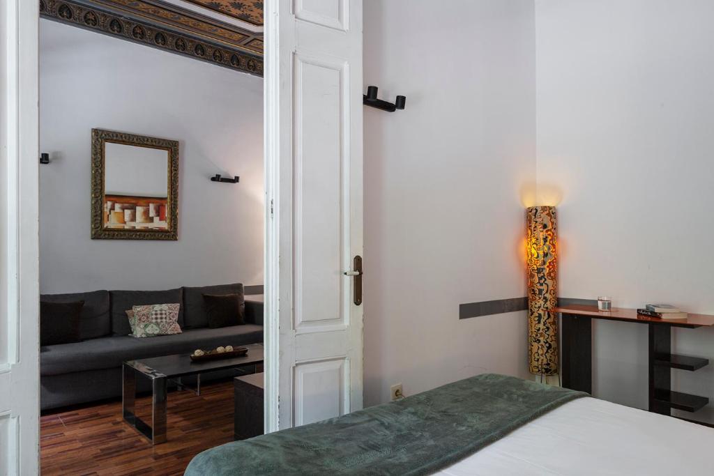 Posteľ alebo postele v izbe v ubytovaní AB Casanova Apartment