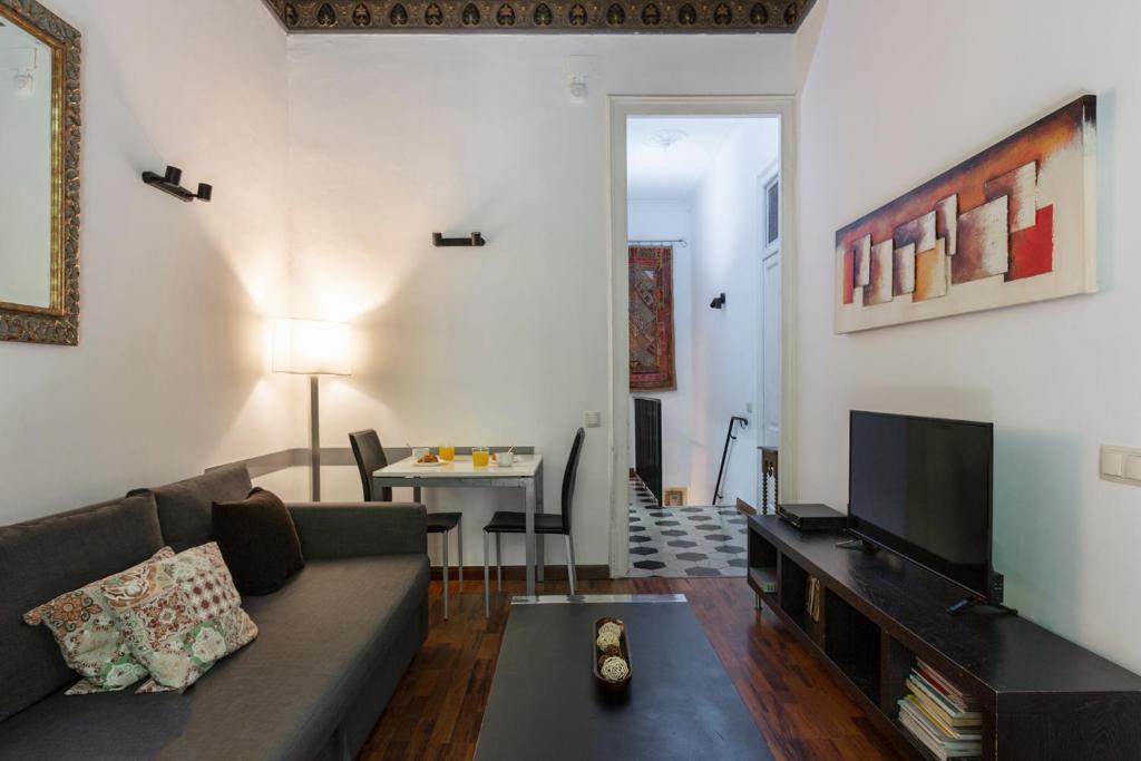 Televízia a/alebo spoločenská miestnosť v ubytovaní AB Casanova Apartment