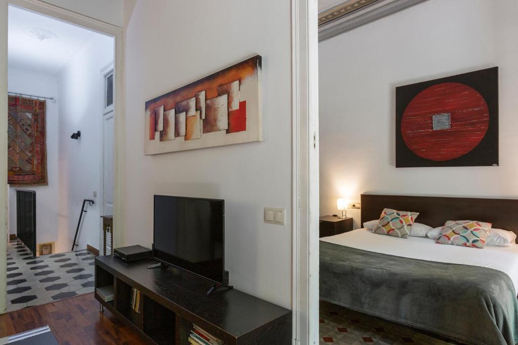 Televízia a/alebo spoločenská miestnosť v ubytovaní AB Casanova Apartment