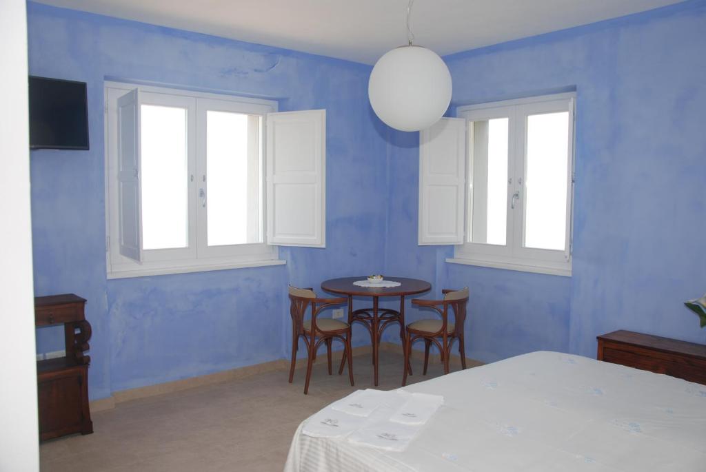 Postel nebo postele na pokoji v ubytování Villa Cirimarco