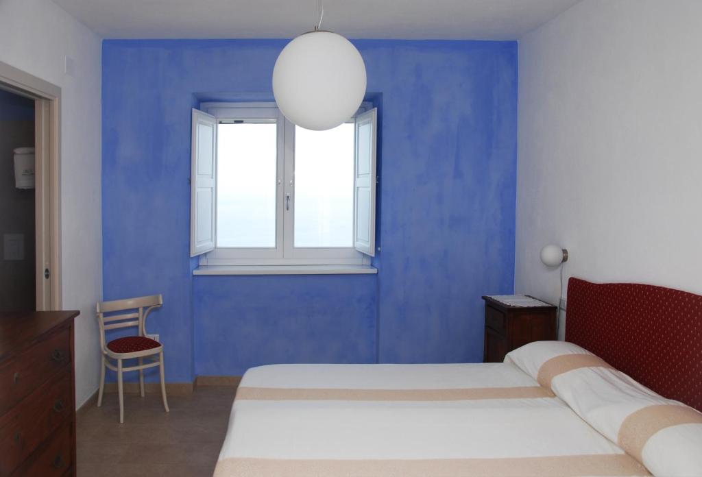 Postel nebo postele na pokoji v ubytování Villa Cirimarco