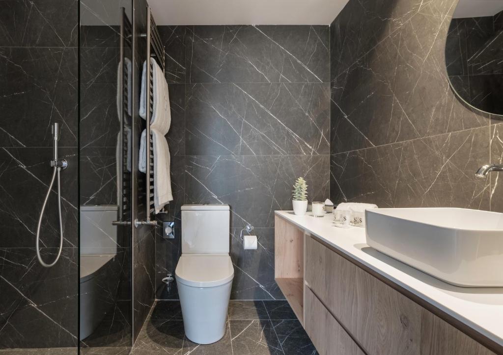 A bathroom at Pure Salt Residences