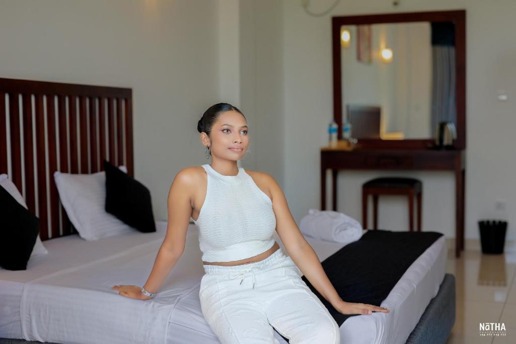 Postel nebo postele na pokoji v ubytování Kandy Hub Guest House