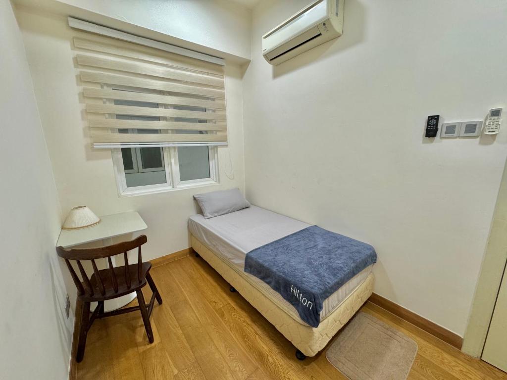 Postel nebo postele na pokoji v ubytování Hostel Hub KL