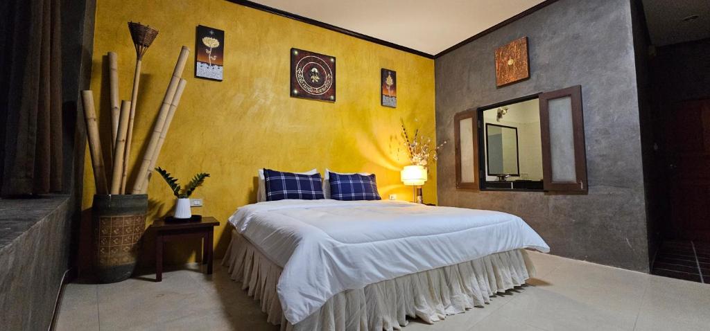 Postel nebo postele na pokoji v ubytování Velanon Phuket