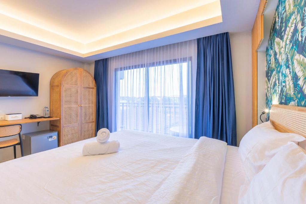Postel nebo postele na pokoji v ubytování Mellow Poshtel - Kata Beach