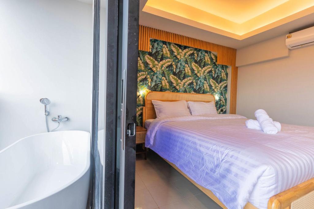 Postel nebo postele na pokoji v ubytování Mellow Poshtel - Kata Beach