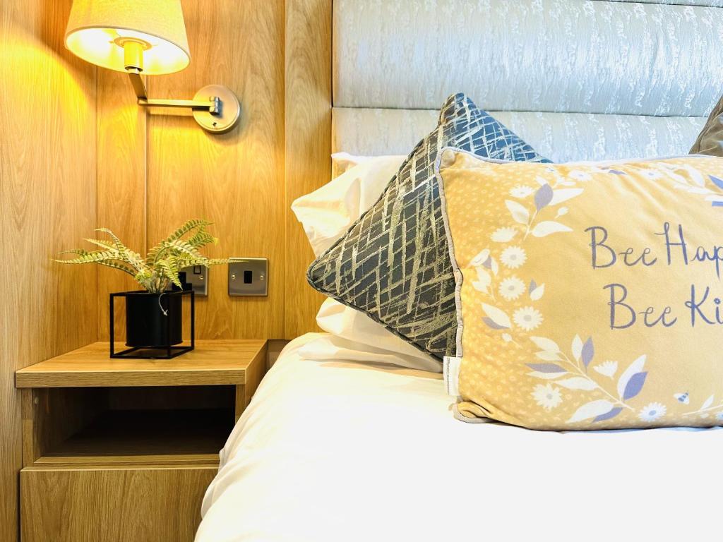 En eller flere senge i et værelse på Ocean Retreat