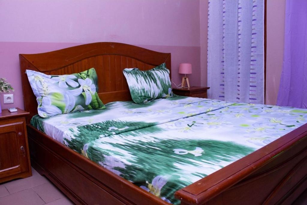 Ένα ή περισσότερα κρεβάτια σε δωμάτιο στο Résidence ALMA