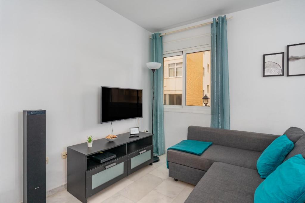Televízia a/alebo spoločenská miestnosť v ubytovaní Nice apartments 20 meters from the beach