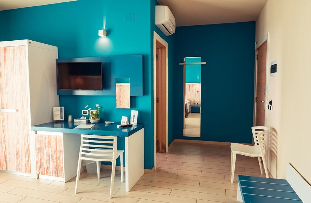TV a/nebo společenská místnost v ubytování Tabù Hotel