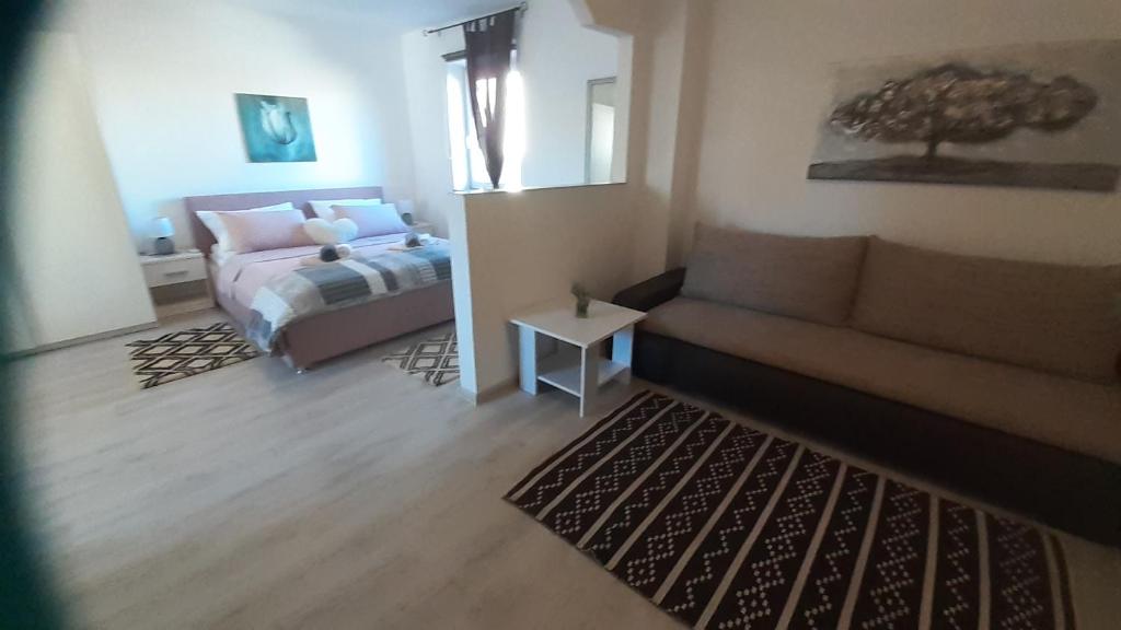 Posteľ alebo postele v izbe v ubytovaní apartmani G&M
