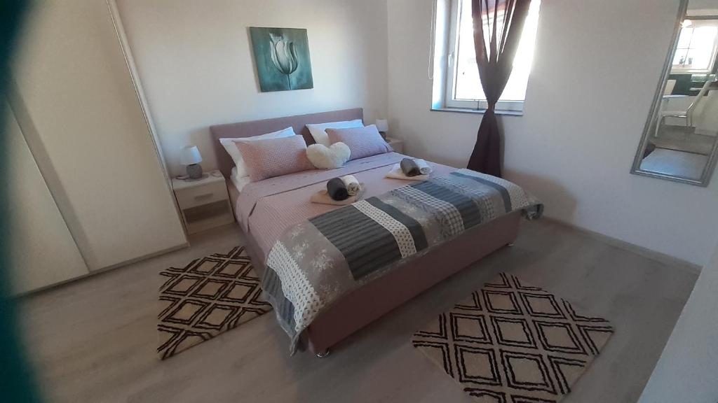 Posteľ alebo postele v izbe v ubytovaní apartmani G&M