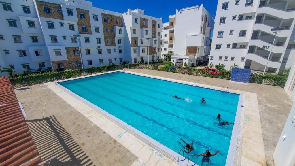 Πισίνα στο ή κοντά στο Homely 2bedroom apartment