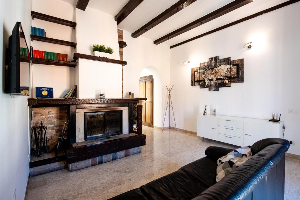 Et opholdsområde på Appartamenti Ferdi - Trilocale o Mansarda