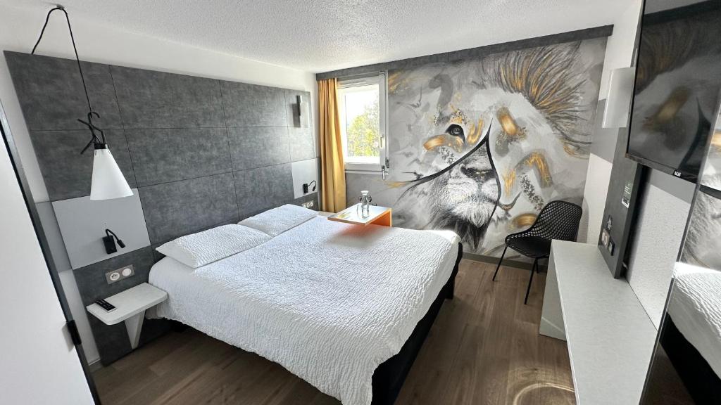 Postel nebo postele na pokoji v ubytování ibis styles Brive Ouest