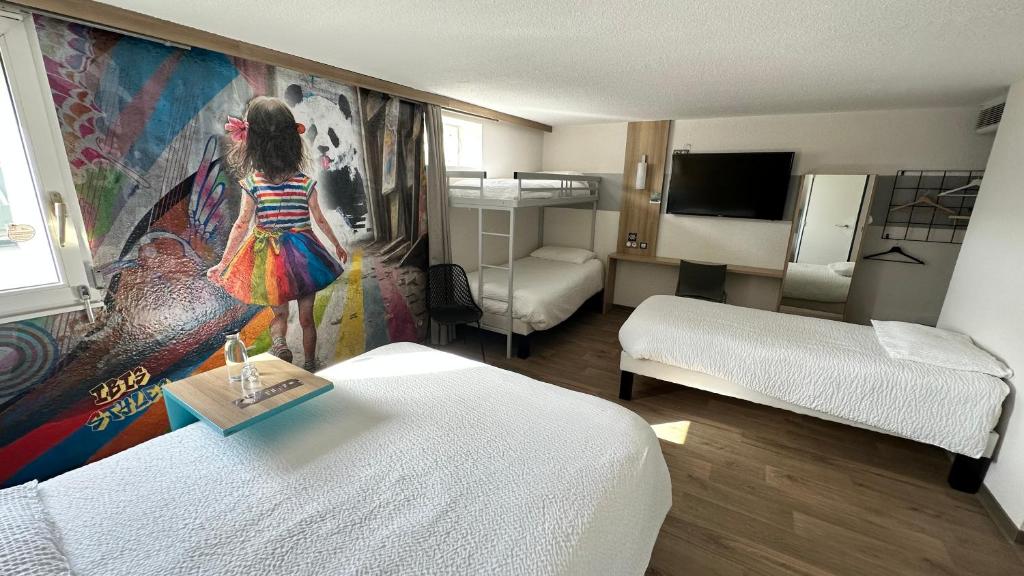 Postel nebo postele na pokoji v ubytování ibis styles Brive Ouest