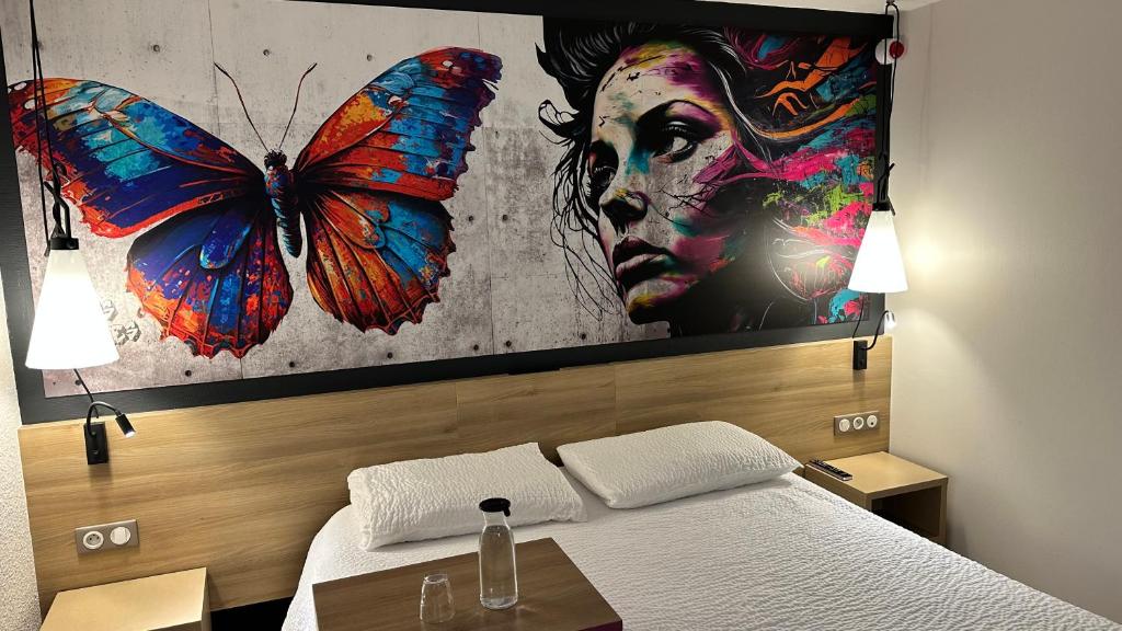 Postel nebo postele na pokoji v ubytování ibis styles Brive Ouest