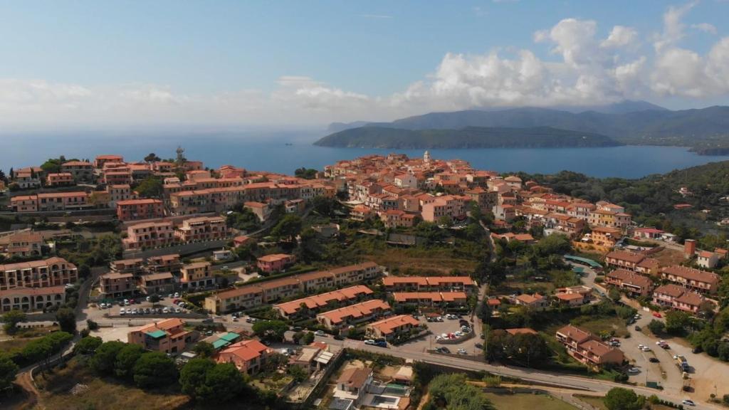 an aerial view of a town next to a body of water at Appartamento La Vela in Portoferraio