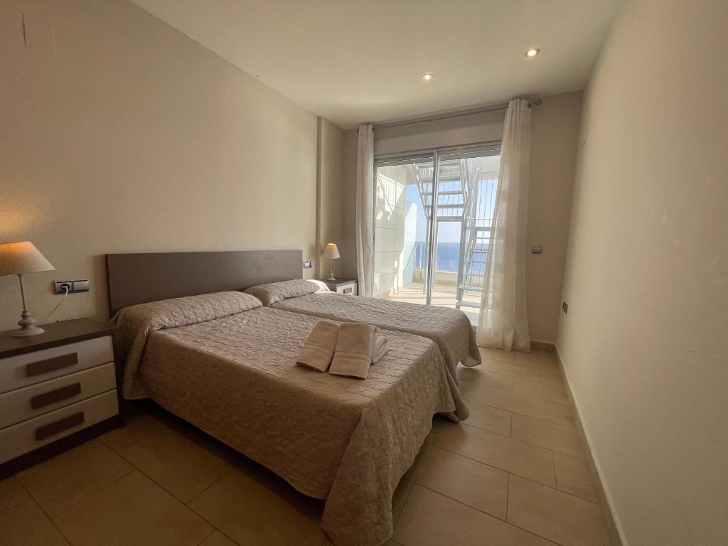 Postel nebo postele na pokoji v ubytování Apartamentos Entremares - Grupo Antonio Perles