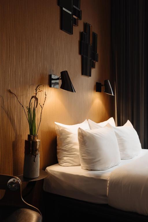 Postel nebo postele na pokoji v ubytování Hotel V Frederiksplein