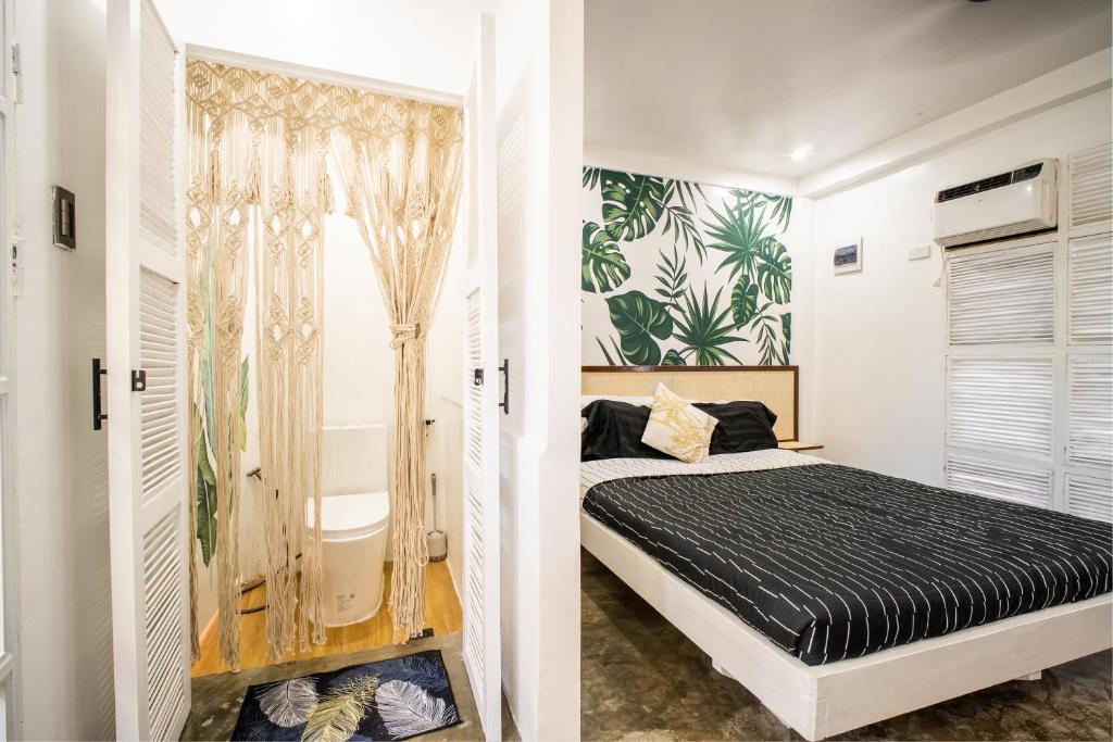 Postel nebo postele na pokoji v ubytování HayyaHayya Villas