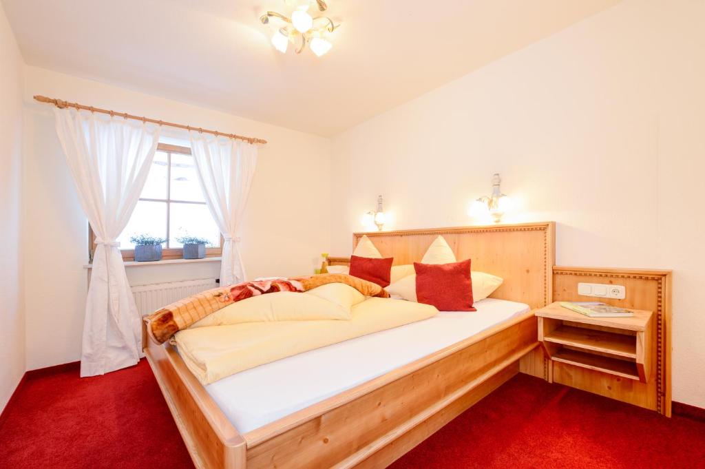 Postel nebo postele na pokoji v ubytování Haus Alpenecho