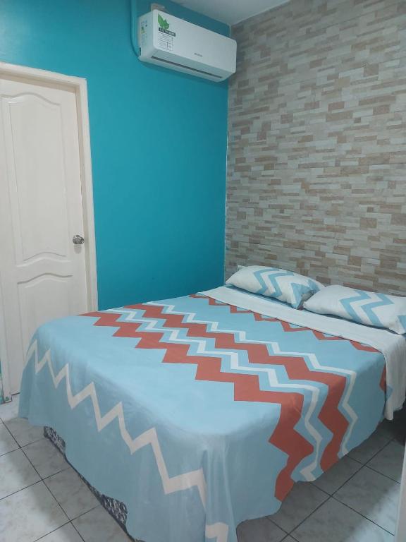 Postel nebo postele na pokoji v ubytování Hotel Dorado Inn