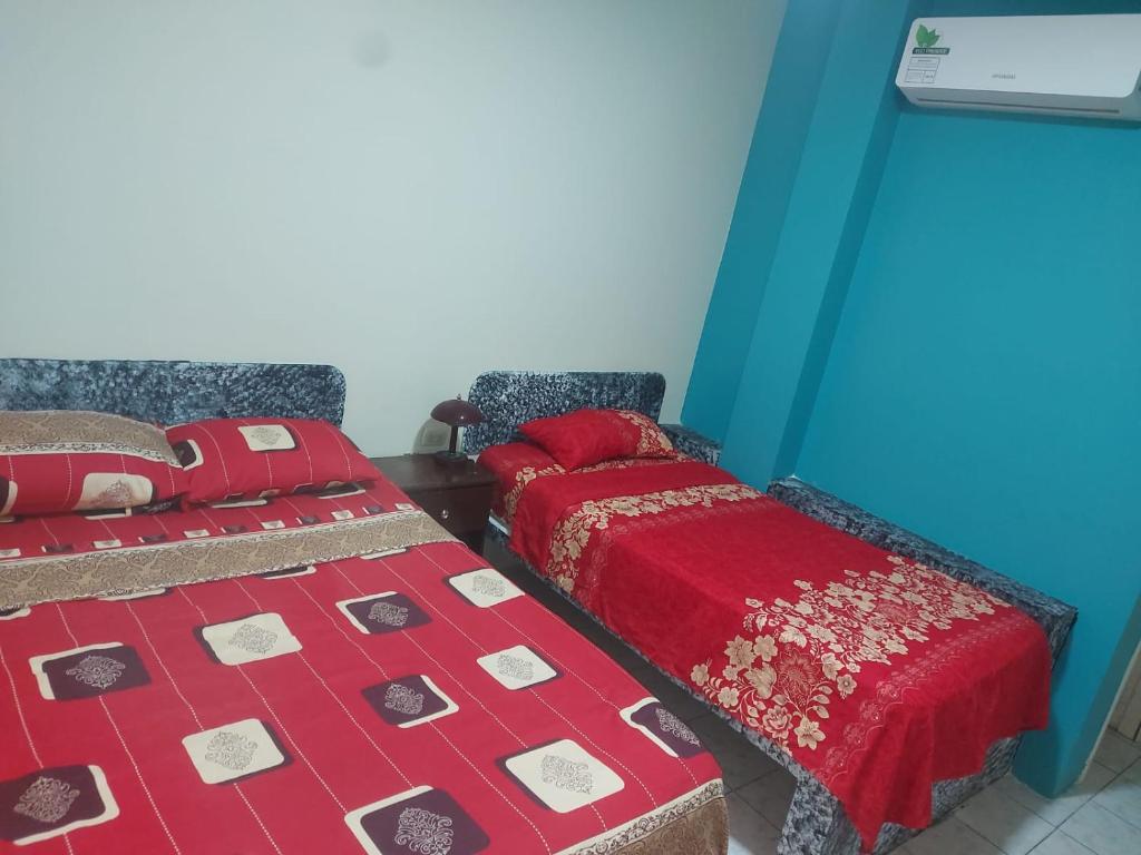 Postel nebo postele na pokoji v ubytování Hotel Dorado Inn