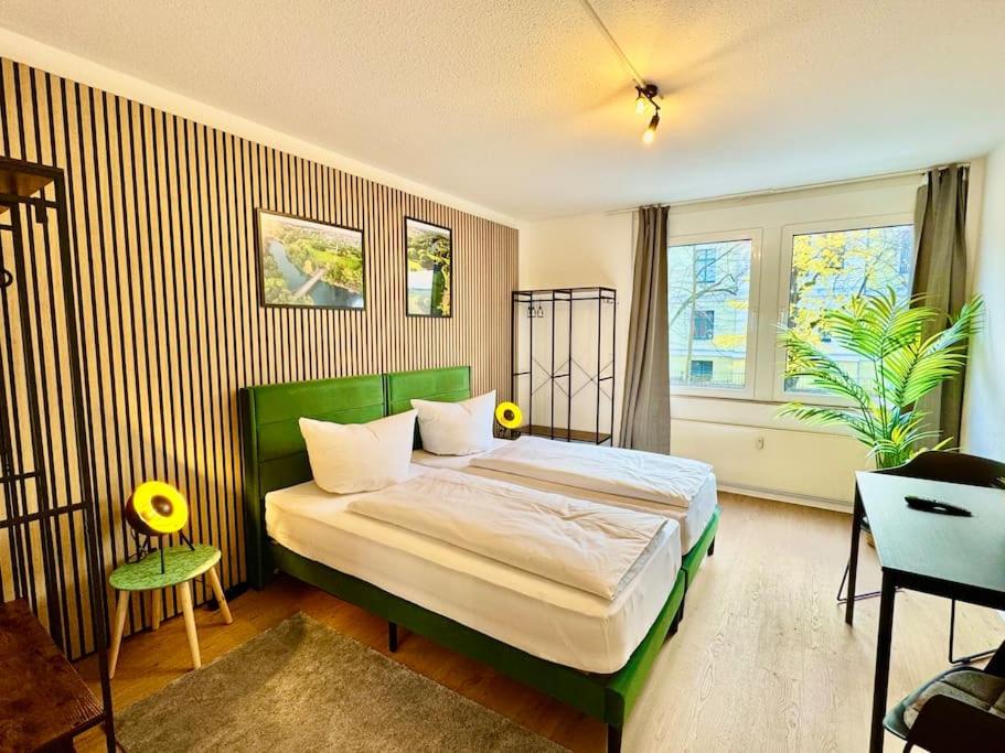 Ένα ή περισσότερα κρεβάτια σε δωμάτιο στο Larooms One