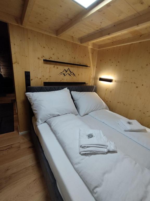 Postel nebo postele na pokoji v ubytování ChaleMani