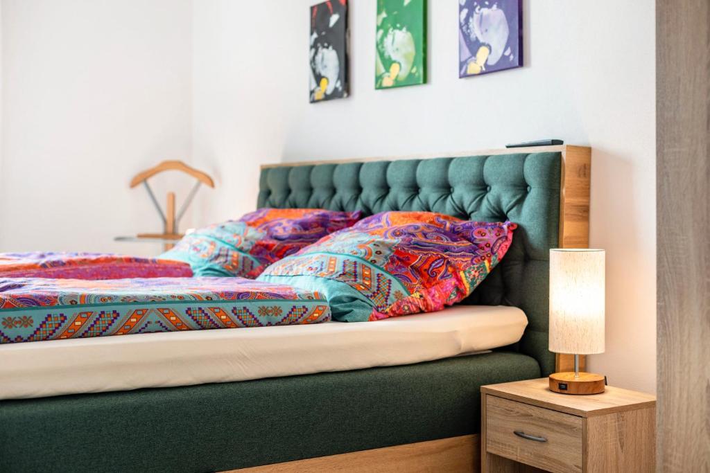 Postel nebo postele na pokoji v ubytování Felsenkeller Appartements