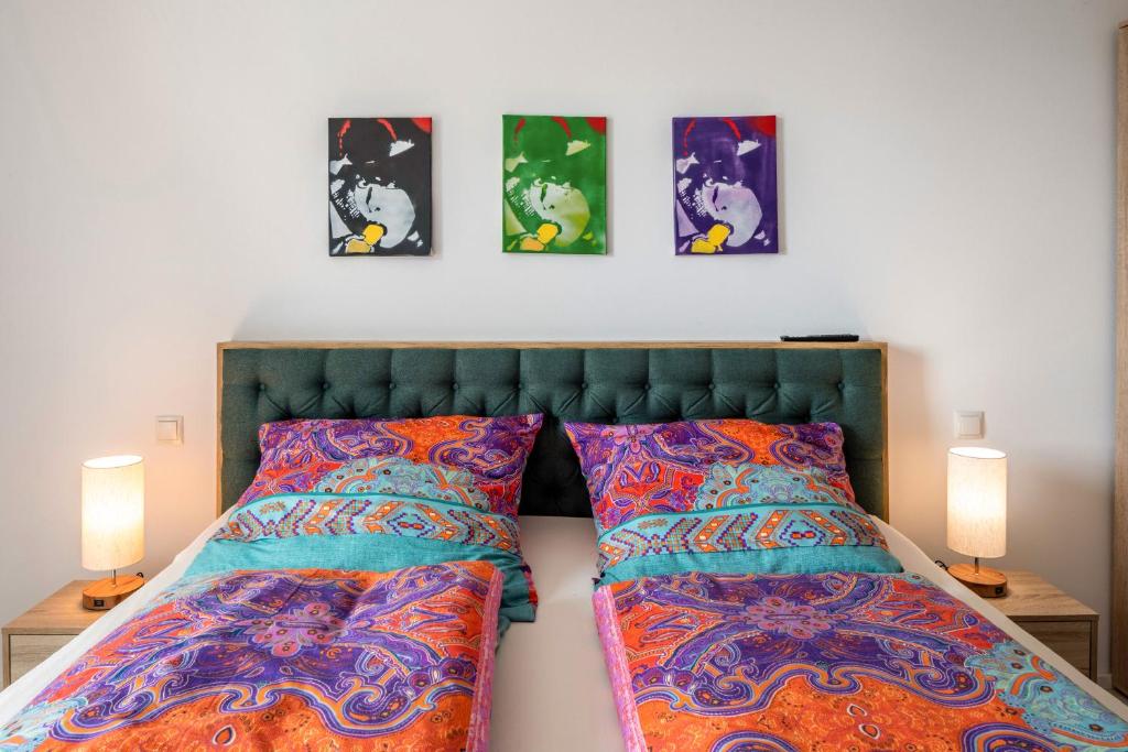 Postel nebo postele na pokoji v ubytování Felsenkeller Appartements