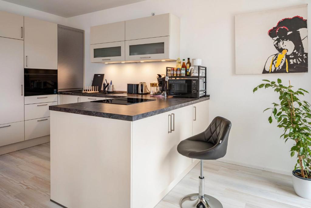 Kuchyň nebo kuchyňský kout v ubytování Felsenkeller Appartements