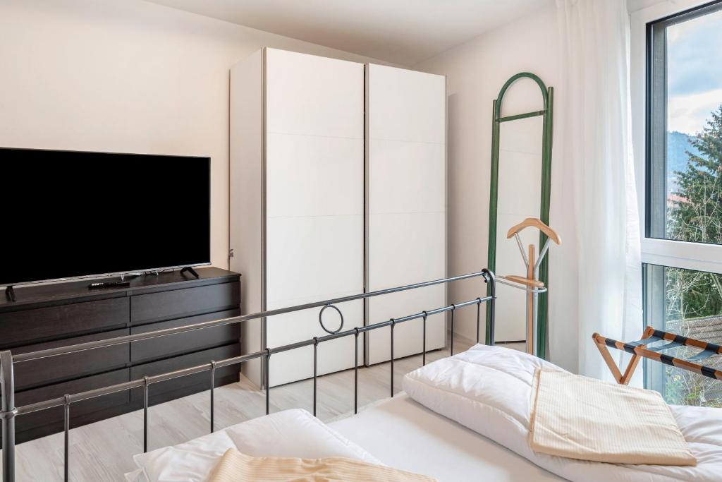 Postel nebo postele na pokoji v ubytování Felsenkeller Appartements