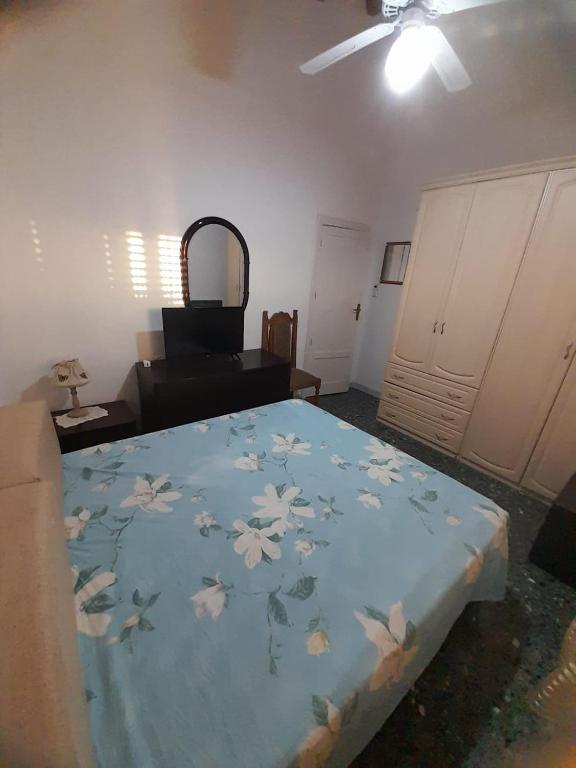 A bed or beds in a room at Casa di Lory Bruca