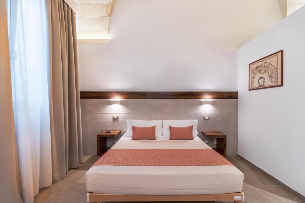 Postel nebo postele na pokoji v ubytování Palazzo San Lazzaro - Jacuzzi Rooms & Suites Lecce Selection