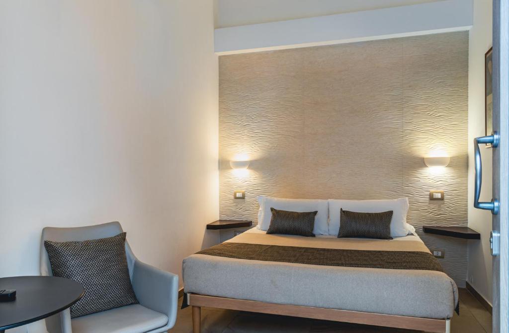 Postel nebo postele na pokoji v ubytování Palazzo San Lazzaro - Jacuzzi Rooms & Suites Lecce Selection