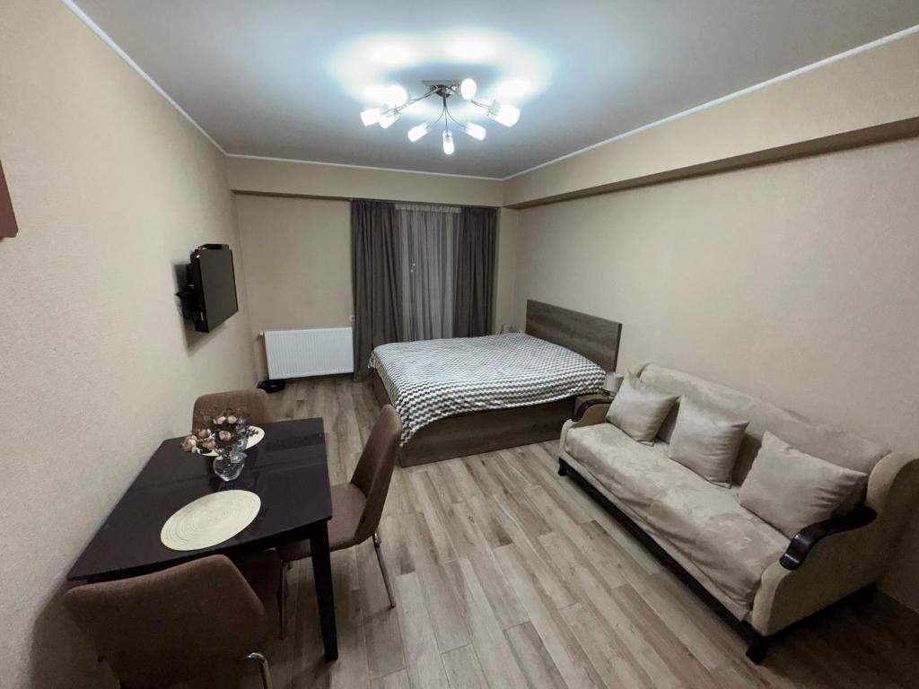 Postel nebo postele na pokoji v ubytování Tamuna Apartment In New Gudauri - Block 3 - N315