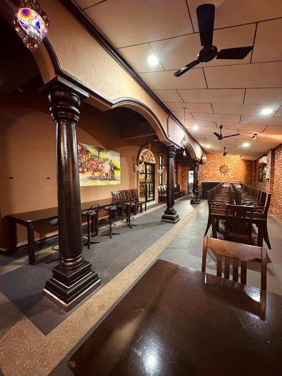 Posezení v ubytování Maxwell Inn Luxury Hotel