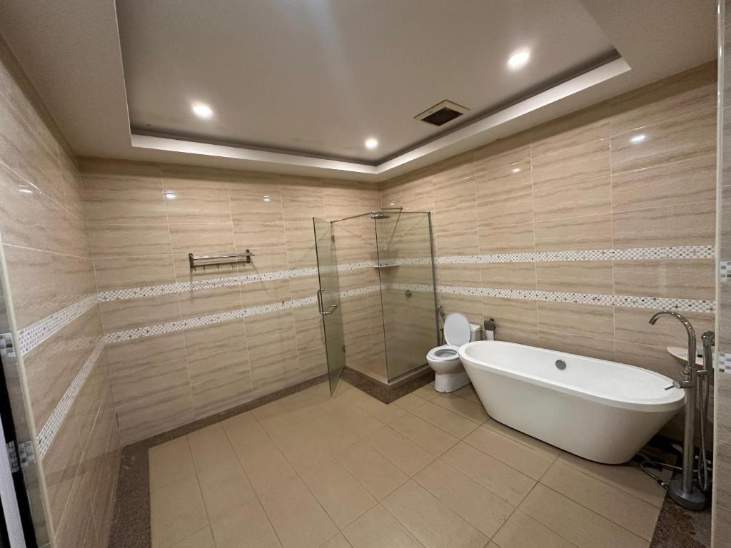 Koupelna v ubytování Maxwell Inn Luxury Hotel